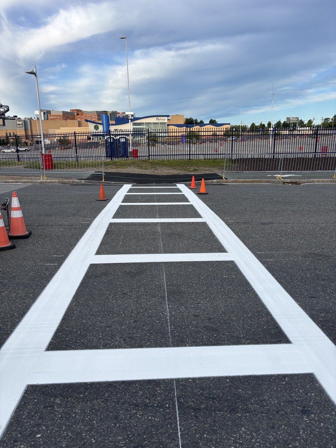 A freshly painted white crosswalk at a Jagged Edge project
